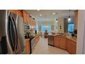 Modern kitchen with stainless steel appliances and granite countertops at 4808 Charles Partin Dr, Parrish, FL 34219