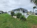 Single-wide manufactured home side view at 5317 Chateau Ln, Bradenton, FL 34207