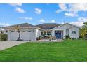 Cute single-story home with attached garage and nicely landscaped yard at 5819 2Nd Avenue Nw Dr, Bradenton, FL 34209