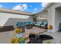 Relaxing patio with fire pit and water feature at 5819 2Nd Avenue Nw Dr, Bradenton, FL 34209
