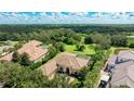 Luxury home with a large backyard and pool at 3342 Founders Club Dr, Sarasota, FL 34240