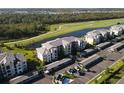 Aerial view of community with lush landscaping at 18028 Gawthrop Dr # 104, Bradenton, FL 34211