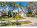 Single-Gathering home with a two-car garage and manicured lawn at 12121 Thornhill Ct, Lakewood Ranch, FL 34202
