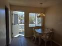Small dining area with a table and four chairs at 1837 Flamingo Blvd # O35, Bradenton, FL 34207