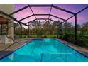 Relaxing screened pool and spa with plenty of space for lounging and entertaining at 1111 143Rd Ne St, Bradenton, FL 34212