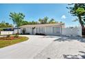 Picture of a delightful single-story home with an inviting entrance and circular driveway at 1012 Myrtle Ave, Venice, FL 34285