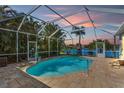 Inviting screened pool area with water views, creating a relaxing outdoor oasis at 11332 Rivers Bluff Cir, Lakewood Ranch, FL 34202
