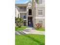 Building exterior showing stairs and walkway at 5122 Northridge Rd # 207, Sarasota, FL 34238