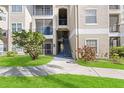Building exterior showing stairs and walkway at 5122 Northridge Rd # 207, Sarasota, FL 34238