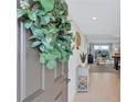 Bright and airy condo entryway with view into living area at 9397 Midnight Pass Rd # 505, Sarasota, FL 34242