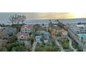 Beachfront home and lot aerial view at 5941 Gulf Of Mexico Dr, Longboat Key, FL 34228
