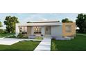 Contemporary home with wood and stucco exterior, inviting walkway at 4014 Bay Shore Rd, Sarasota, FL 34234