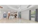 Open concept kitchen with stainless steel appliances and island at 1269 Backspin Dr, Englewood, FL 34223