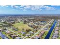 Wide aerial view of a residential neighborhood at 54 Medalist Pl, Rotonda West, FL 33947