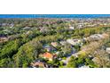Bird's-eye view of a house and surrounding neighborhood, near the water at 21 Bayhead Ln, Osprey, FL 34229