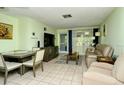 Light and airy living room with comfortable seating and dining area at 6041 Lilli Way # 72, Bradenton, FL 34207