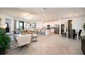 Open living space with kitchen and dining area at 17825 Gawthrop Dr # 103, Bradenton, FL 34211