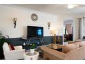 Comfortable living room with built-in shelving at 17825 Gawthrop Dr # 103, Bradenton, FL 34211
