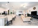 Open concept kitchen with island and stainless steel appliances at 17825 Gawthrop Dr # 103, Bradenton, FL 34211