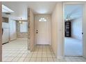 Condo entryway with view of kitchen and living room at 4382 Madeira Ct # 3361, Sarasota, FL 34233