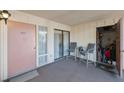Condo entryway with storage and seating area at 6435 Egret Ln # 409, Bradenton, FL 34210