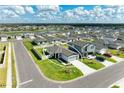 Aerial view of a house with backyard patio at 7160 Boggy Creek Pl, Parrish, FL 34219