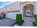 Front view of villa with attached garage at 4818 61St Avenue W Ter, Bradenton, FL 34210