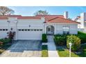 Villa with attached garage and walkway at 4818 61St Avenue W Ter, Bradenton, FL 34210