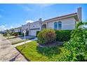 Street view of villas with attached garages at 4818 61St Avenue W Ter, Bradenton, FL 34210