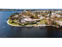 House on a waterfront lot with a dock and canal views at 543 Key Royale Dr, Holmes Beach, FL 34217