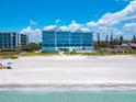 Beachfront condo building with pool and beach access at 4651 Gulf Of Mexico Dr # 402, Longboat Key, FL 34228