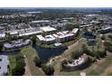 Aerial view of condo building near golf course at 4550 Pinebrook Cir # 103, Bradenton, FL 34209