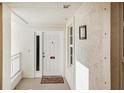 Front door entrance to condo with welcome mat at 2715 Terra Ceia Bay Blvd # 201, Palmetto, FL 34221