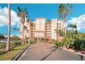 Building entrance with palm trees and parking at 2715 Terra Ceia Bay Blvd # 201, Palmetto, FL 34221