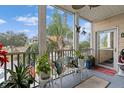Screened balcony boasting a view of the community and lush greenery at 4802 51St W St # 1010, Bradenton, FL 34210