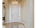 Bright and spacious entryway with tile flooring at 1165 Cielo Ct, North Venice, FL 34275