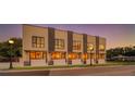 Row of modern townhouses with large windows and landscaping at 1762 10Th St, Sarasota, FL 34236