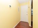 Bright entryway with wood-look floors and neutral walls at 2465 Northside Dr # 906, Clearwater, FL 33761