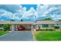 Attractive condo with carport and manicured lawn at 2609 Riverbluff Pkwy # 146, Sarasota, FL 34231