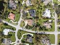 Neighborhood aerial view showcases the home's location, landscaping, and privacy at 7317 Crape Myrtle Way, Sarasota, FL 34241