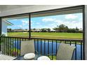Enjoy serene golf course views from this screened lanai, complete with patio furniture at 1100 Capri Isles Blvd # 523, Venice, FL 34292