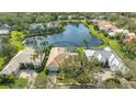 Home with a pool located in a desirable waterfront community at 7506 Eaton Ct, University Park, FL 34201