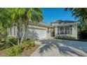Home's exterior showcasing the front entrance and garage at 7407 Sea Island Ln, Bradenton, FL 34201