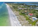 Beachfront property aerial view, home with pool at 5919 Gulf Of Mexico Dr, Longboat Key, FL 34228