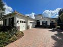 Stunning two-story home features a three-car garage and beautiful landscaping at 15618 Castle Park Ter, Lakewood Ranch, FL 34202