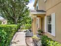 Inviting front entrance with well-maintained landscaping and a clear view of the home's facade at 6205 Triple Tail Ct # 101, Lakewood Ranch, FL 34202