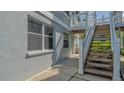 Exterior staircase leading to condo unit at 1328 Siesta Bayside Dr # 1328-C, Sarasota, FL 34242