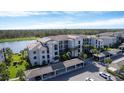 Luxury condo building showcasing resort-style living near water at 17626 Gawthrop Dr # 201, Bradenton, FL 34211