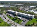 Aerial view of condo building showcasing its size and location at 4480 Ironwood Cir # 202A, Bradenton, FL 34209