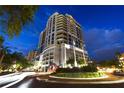 Luxury high rise building at night at 50 Central Ave # 16S, Sarasota, FL 34236